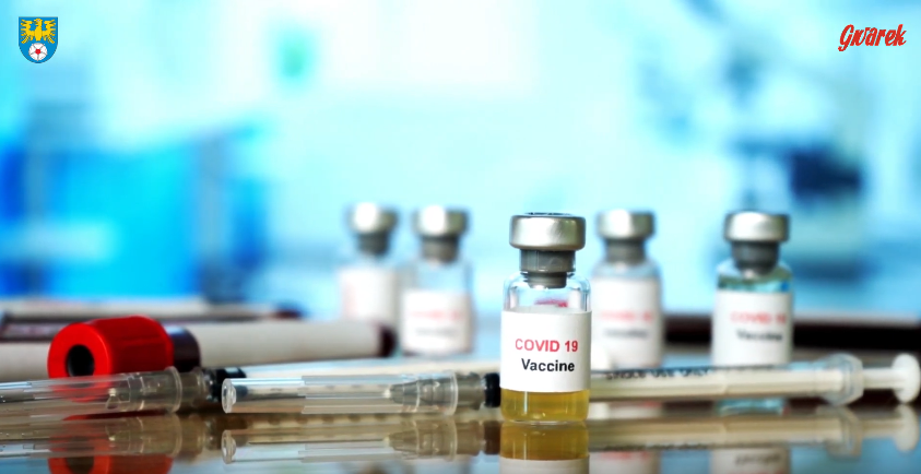 Grafika dekoracyjna przedstawiająca ampułke ze szczepionką